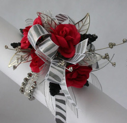 WRIST CORSAGE RED ROSES PC100 from Fabbrini's Flowers in Hoffman Estates, IL
