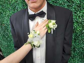 WC101 White Spray Rose Wrist Corsage and Boutonniere from Fabbrini's Flowers in Hoffman Estates, IL