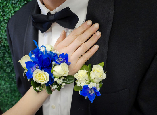 WC121 Blue Wrist Corsage and Boutonniere from Fabbrini's Flowers in Hoffman Estates, IL